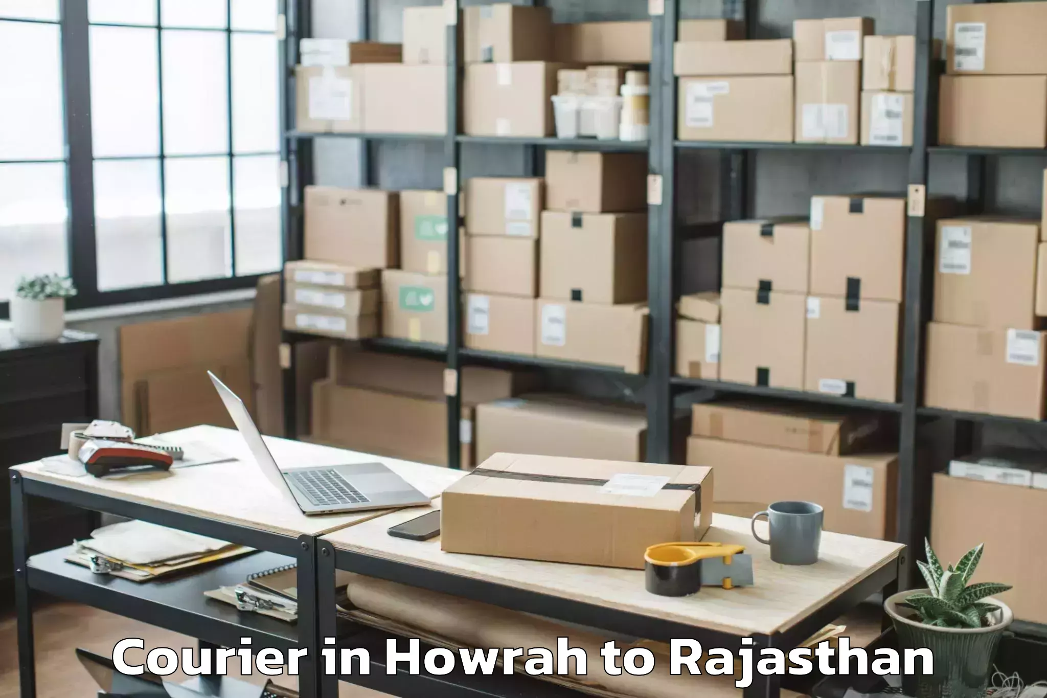 Affordable Howrah to Churu Courier